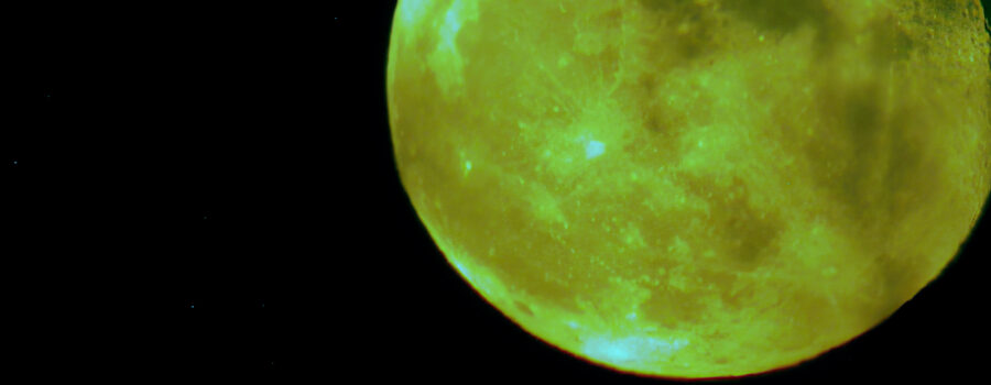 Full moon rising. An interesting photo taken with a Leica Televid77 spotting scope with a Nikon E4500 attached.